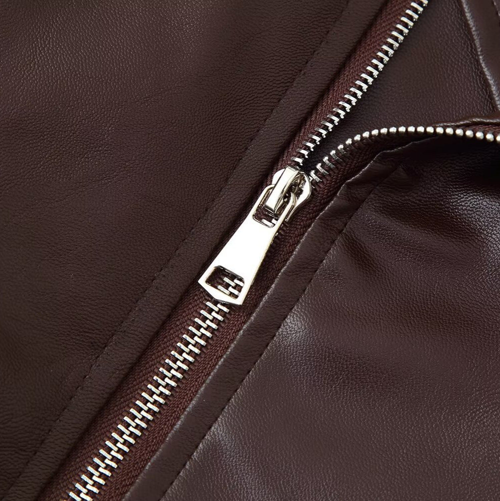 Short leather jacket with belt and loose fit